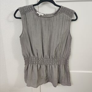 Crinkle Sleeveless Peplum Top